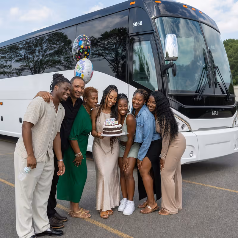 Passengers loading luggage while boarding an New Orleans group shuttle