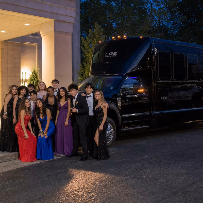 Party bus interior with wraparound leather seating and LED lighting in New Orleans