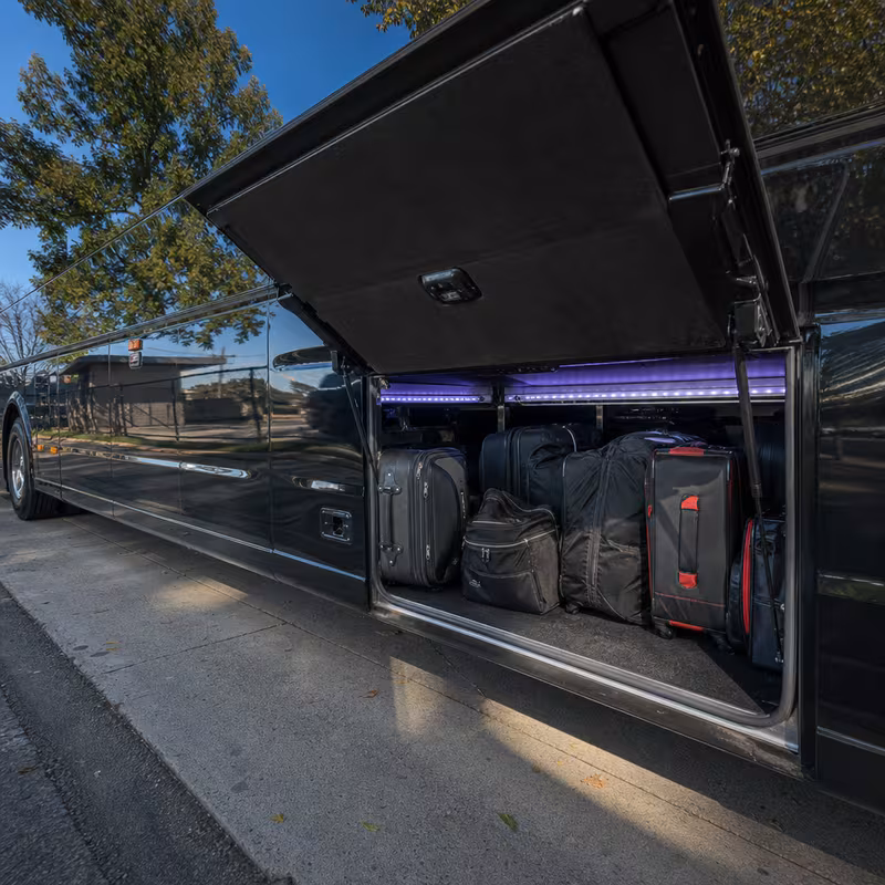 Party bus interior with wraparound leather seating and LED lighting in New Orleans