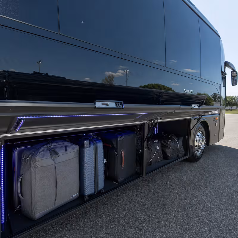Party bus interior with wraparound leather seating and LED lighting in New Orleans