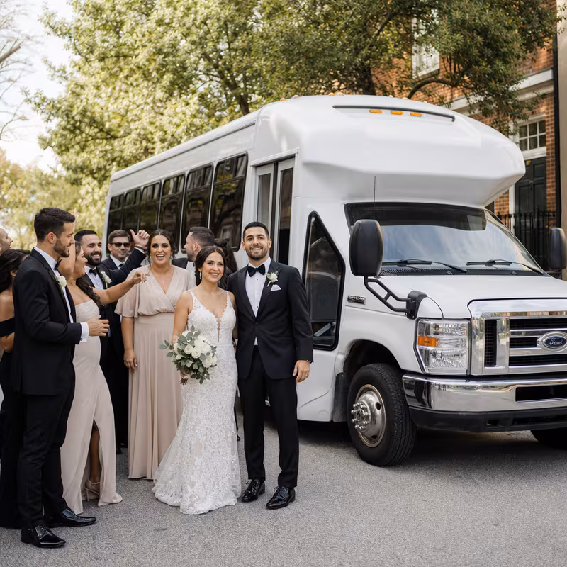 Passengers loading luggage while boarding an New Orleans group shuttle
