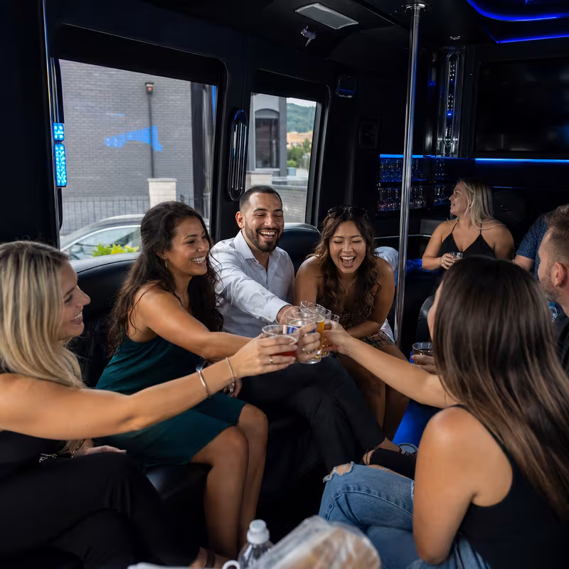 Group boarding a white charter bus for Winery & Brewery Tour Transportation transportation in New Orleans